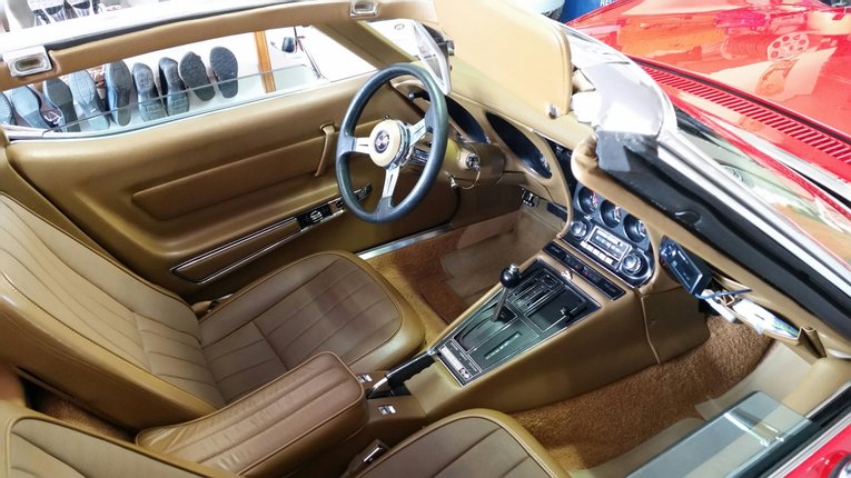 Unknown-Corvette-1969-torch-red-saddle