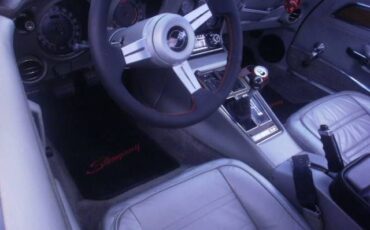 Unknown-Corvette-1974-Medium-Red-Metallic-Silver-Leather-7