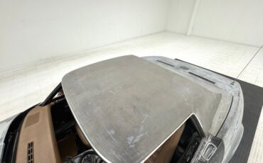 Unknown-Corvette-1974-Primer-Gray-Medium-Saddle-36