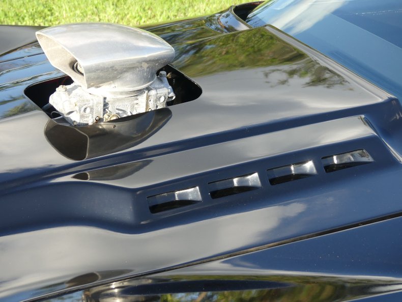 Unknown-Corvette-1975-Black-Black-and-Red-34