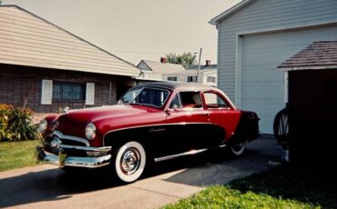Unknown-Crestliner-1950-MaroonBlack