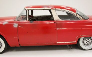 Unknown-Crown-victoria-1955-Red-Black