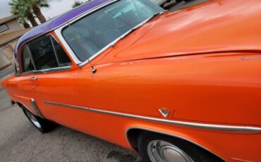 Unknown-Customline-1953-Orange-1