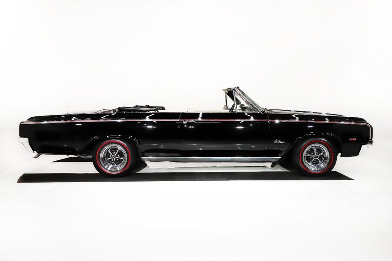 Unknown-Cutlass-1964-Ebony-Black-White-18