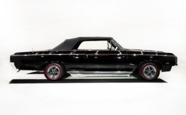 Unknown-Cutlass-1964-Ebony-Black-White-35