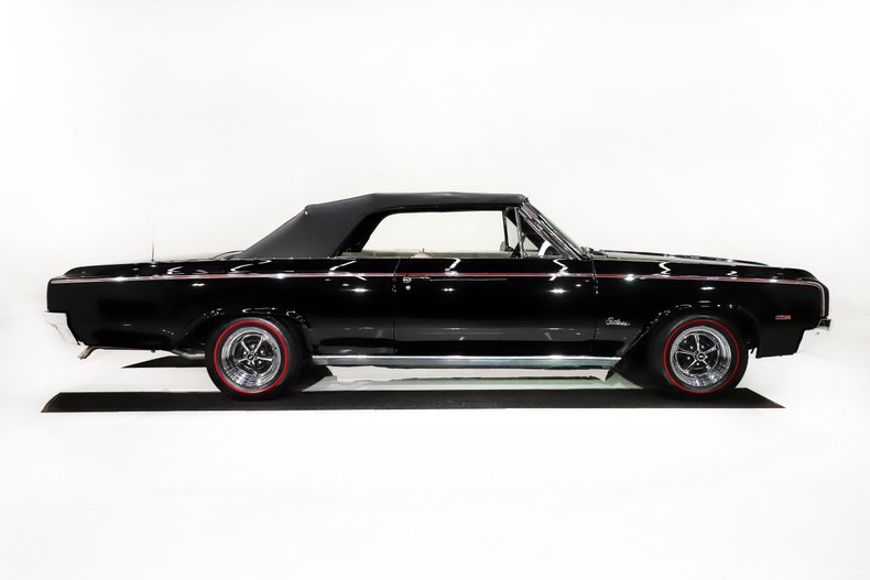 Unknown-Cutlass-1964-Ebony-Black-White-35