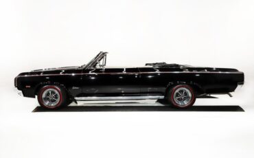 Unknown-Cutlass-1964-Ebony-Black-White-46
