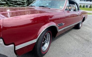 Unknown-Cutlass-1966-MaroonBlack-Top-Black-Vinyl-11