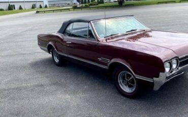 Unknown-Cutlass-1966-MaroonBlack-Top-Black-Vinyl-13