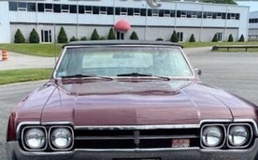 Unknown-Cutlass-1966-MaroonBlack-Top-Black-Vinyl-16