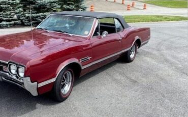 Unknown-Cutlass-1966-MaroonBlack-Top-Black-Vinyl-19