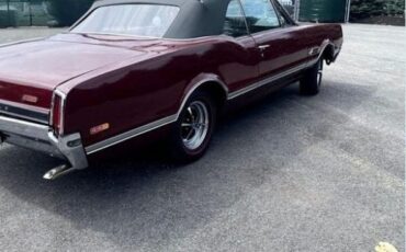 Unknown-Cutlass-1966-MaroonBlack-Top-Black-Vinyl-5