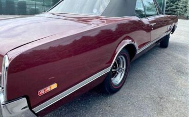 Unknown-Cutlass-1966-MaroonBlack-Top-Black-Vinyl-6