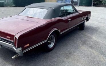 Unknown-Cutlass-1966-MaroonBlack-Top-Black-Vinyl-9