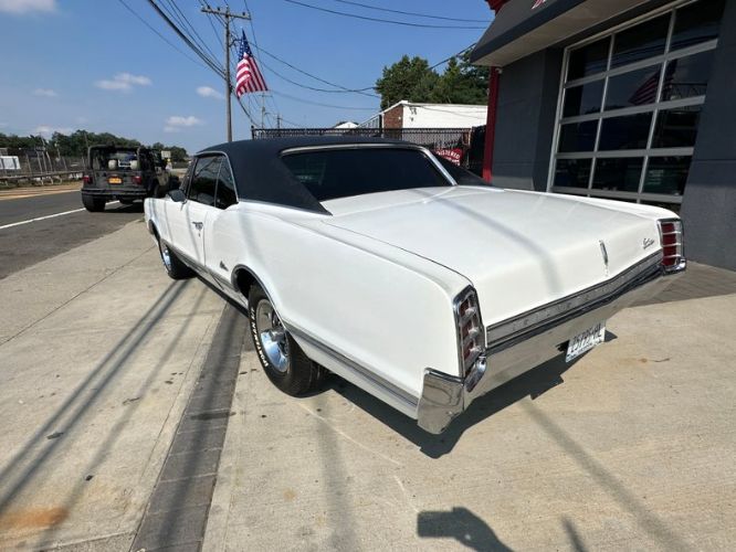 Unknown-Cutlass-1966-White-Black-26