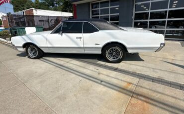 Unknown-Cutlass-1966-White-Black-3