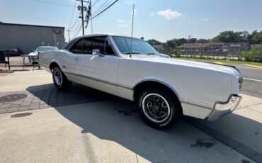 Unknown-Cutlass-1966-White-Black