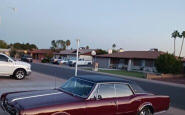 Unknown-Cutlass-1967-Red-Black