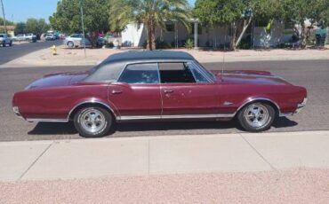 Unknown-Cutlass-1967-Red-Black-4