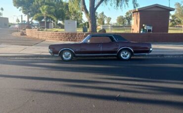 Unknown-Cutlass-1967-Red-Black-7