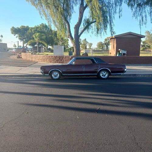 Unknown-Cutlass-1967-Red-Black-7