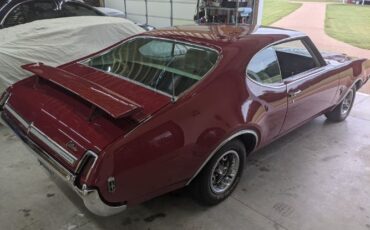 Unknown-Cutlass-1969-Crimson-Red-Pearl-White-14