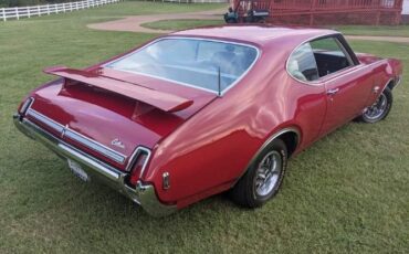 Unknown-Cutlass-1969-Crimson-Red-Pearl-White-16