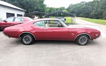 Unknown-Cutlass-1969-Crimson-Red-Pearl-White-18