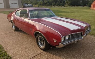 Unknown-Cutlass-1969-Crimson-Red-Pearl-White-20