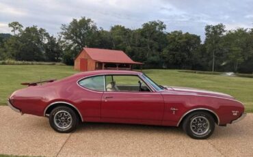 Unknown-Cutlass-1969-Crimson-Red-Pearl-White-24