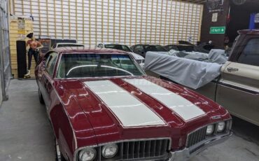 Unknown-Cutlass-1969-Crimson-Red-Pearl-White-25