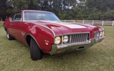 Unknown-Cutlass-1969-Crimson-Red-Pearl-White-28