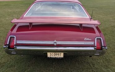 Unknown-Cutlass-1969-Crimson-Red-Pearl-White-29