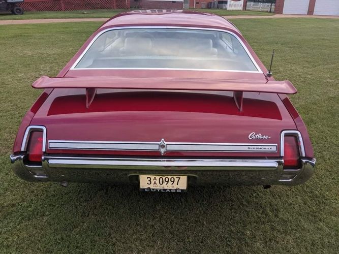 Unknown-Cutlass-1969-Crimson-Red-Pearl-White-29