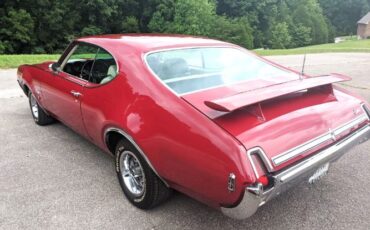 Unknown-Cutlass-1969-Crimson-Red-Pearl-White-35