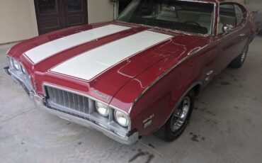 Unknown-Cutlass-1969-Crimson-Red-Pearl-White-42