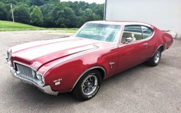 Unknown-Cutlass-1969-Crimson-Red-Pearl-White-44