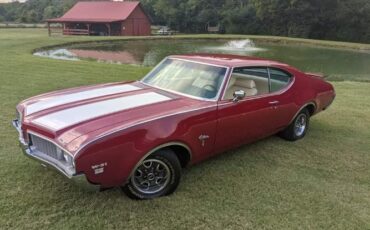 Unknown-Cutlass-1969-Crimson-Red-Pearl-White-45