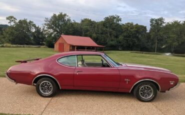 Unknown-Cutlass-1969-Crimson-Red-Pearl-White-6