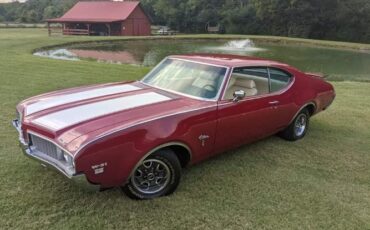 Unknown-Cutlass-1969-Crimson-RedWhite-Pearl-White-24