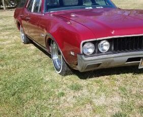 Unknown-Cutlass-1969-Red-Black-2