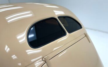 Unknown-Deluxe-1937-Vermillion-Red-Tan-16