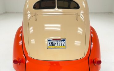 Unknown-Deluxe-1937-Vermillion-Red-Tan-2