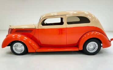 Unknown-Deluxe-1937-Vermillion-Red-Tan