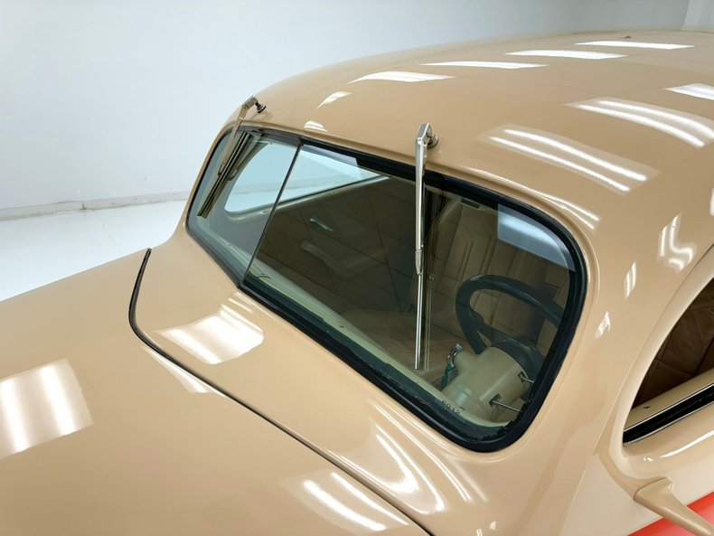 Unknown-Deluxe-1937-Vermillion-Red-Tan-48