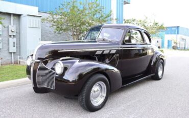 Unknown-Deluxe-1940-Black-Red-1
