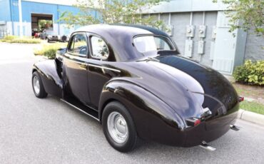 Unknown-Deluxe-1940-Black-Red-12