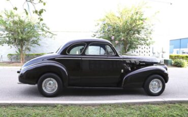 Unknown-Deluxe-1940-Black-Red-3