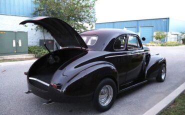 Unknown-Deluxe-1940-Black-Red-4