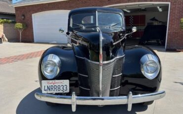 Unknown-Deluxe-1940-Black-Tan